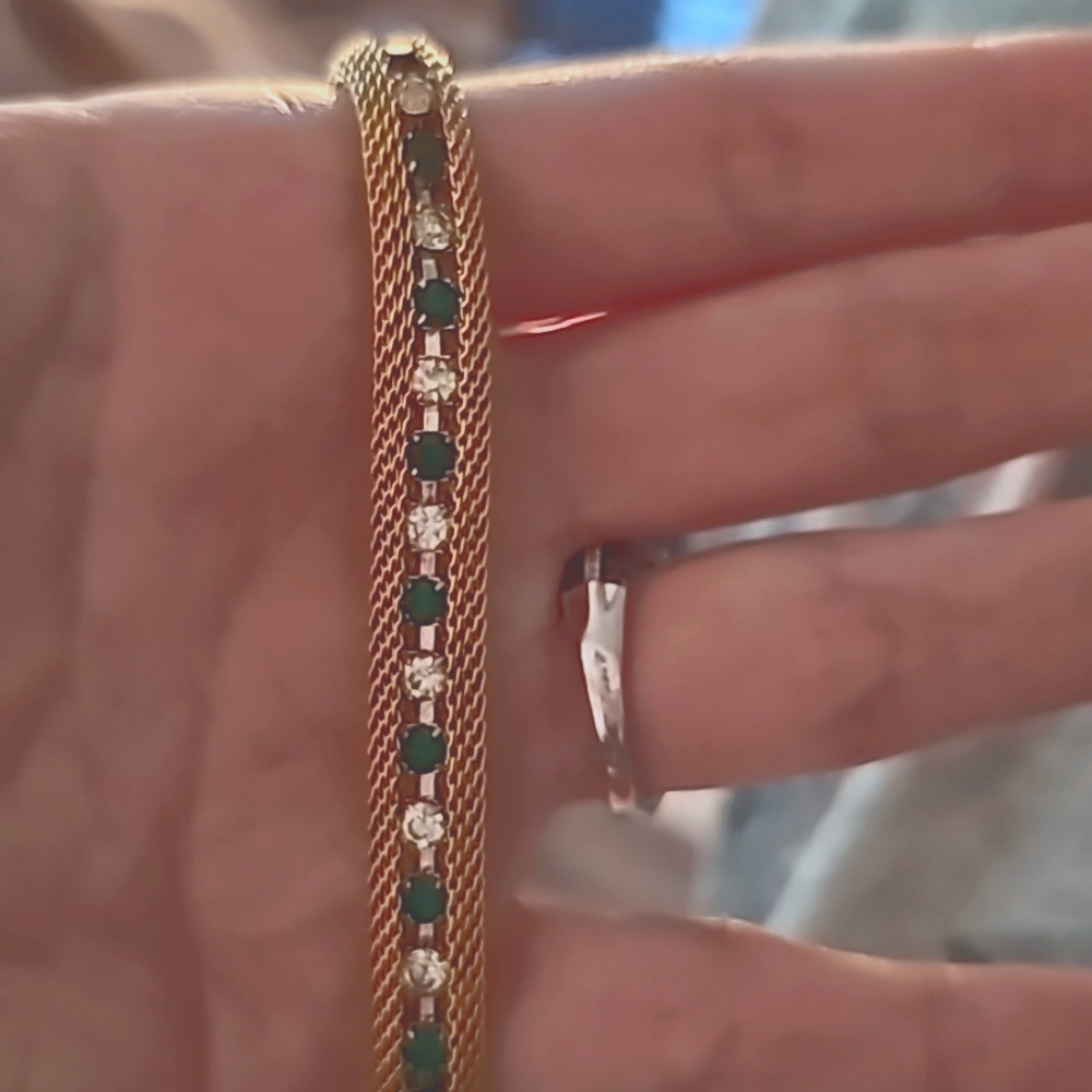 Stunning green emerald and diamond tennis braclet for that preppy loved one!